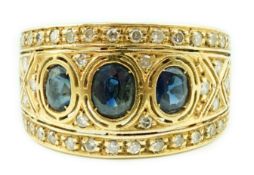 An Italian Byzantine style 18k gold, sapphire and diamond cluster ring, set with graduated oval