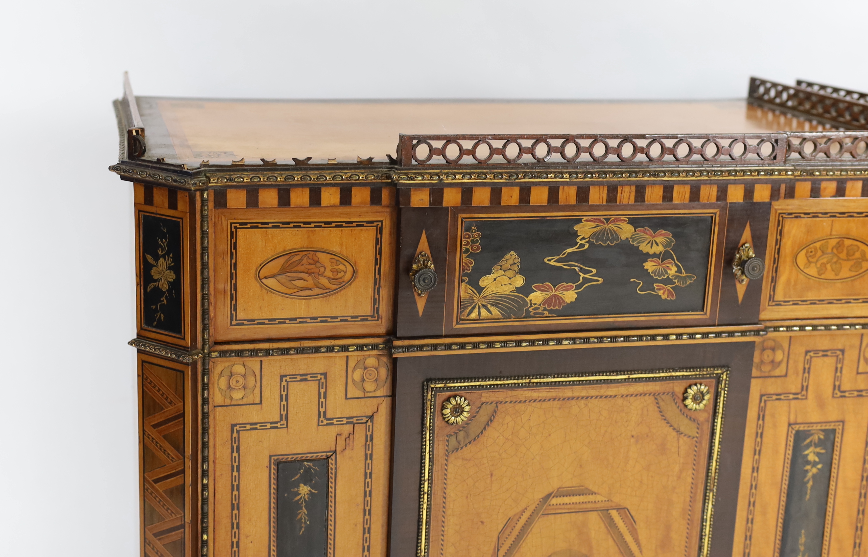 A pair of French Transitional style satinwood and marquetry side cabinets, each with fretwork - Image 4 of 6