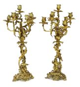 A pair of late 19th century French Louis XVI style ormolu seven light candelabra, each with