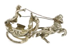 A late 19th century silver miniature model of a horse driven sleigh, with putto, import marks for