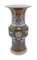 A large Chinese archaistic underglaze blue and copper red vase, zun, late 19th century, decorated