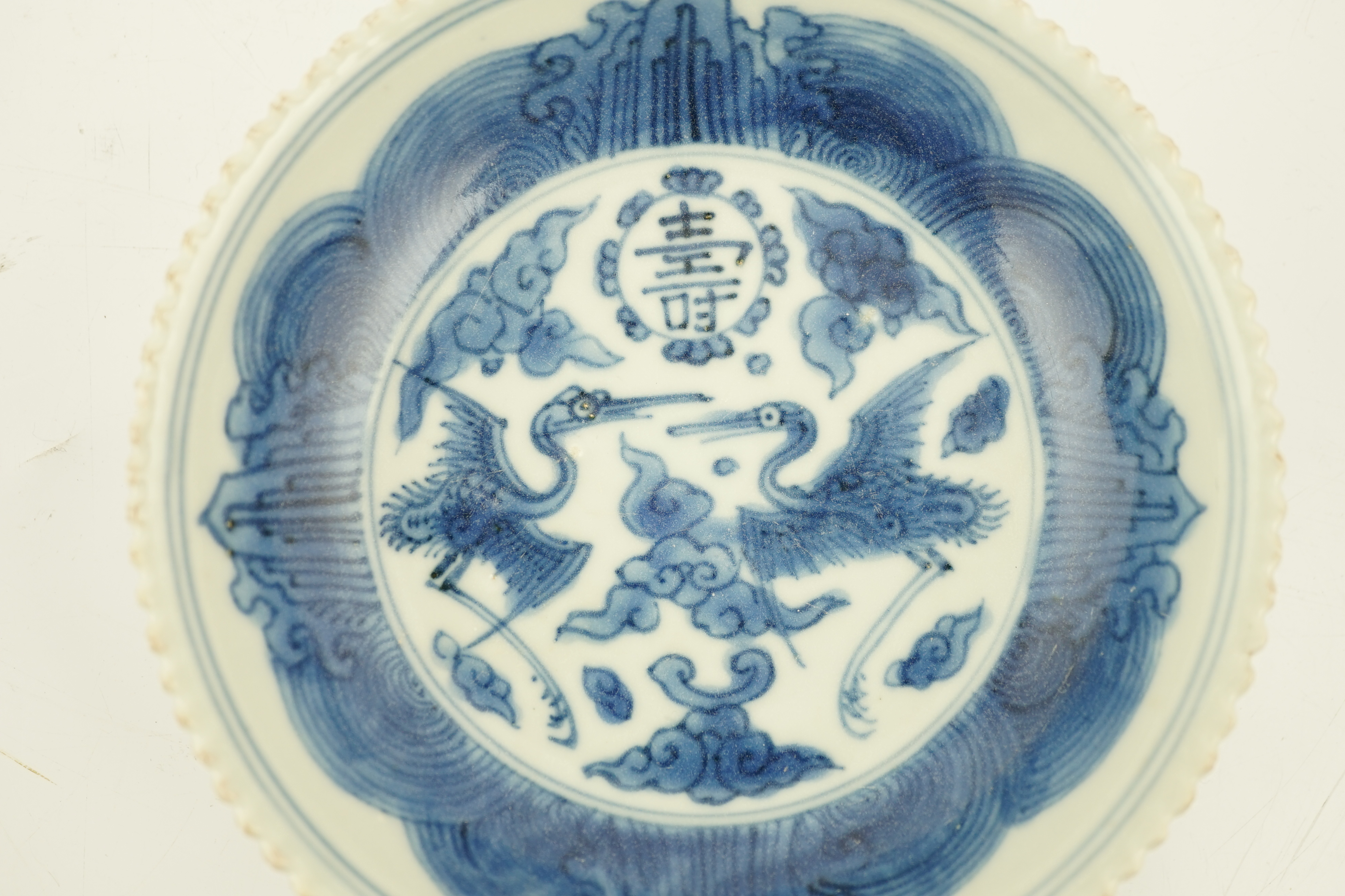 A Chinese blue and white ‘phoenix’ saucer dish, Jiajing mark and probably of the period, the - Image 3 of 4