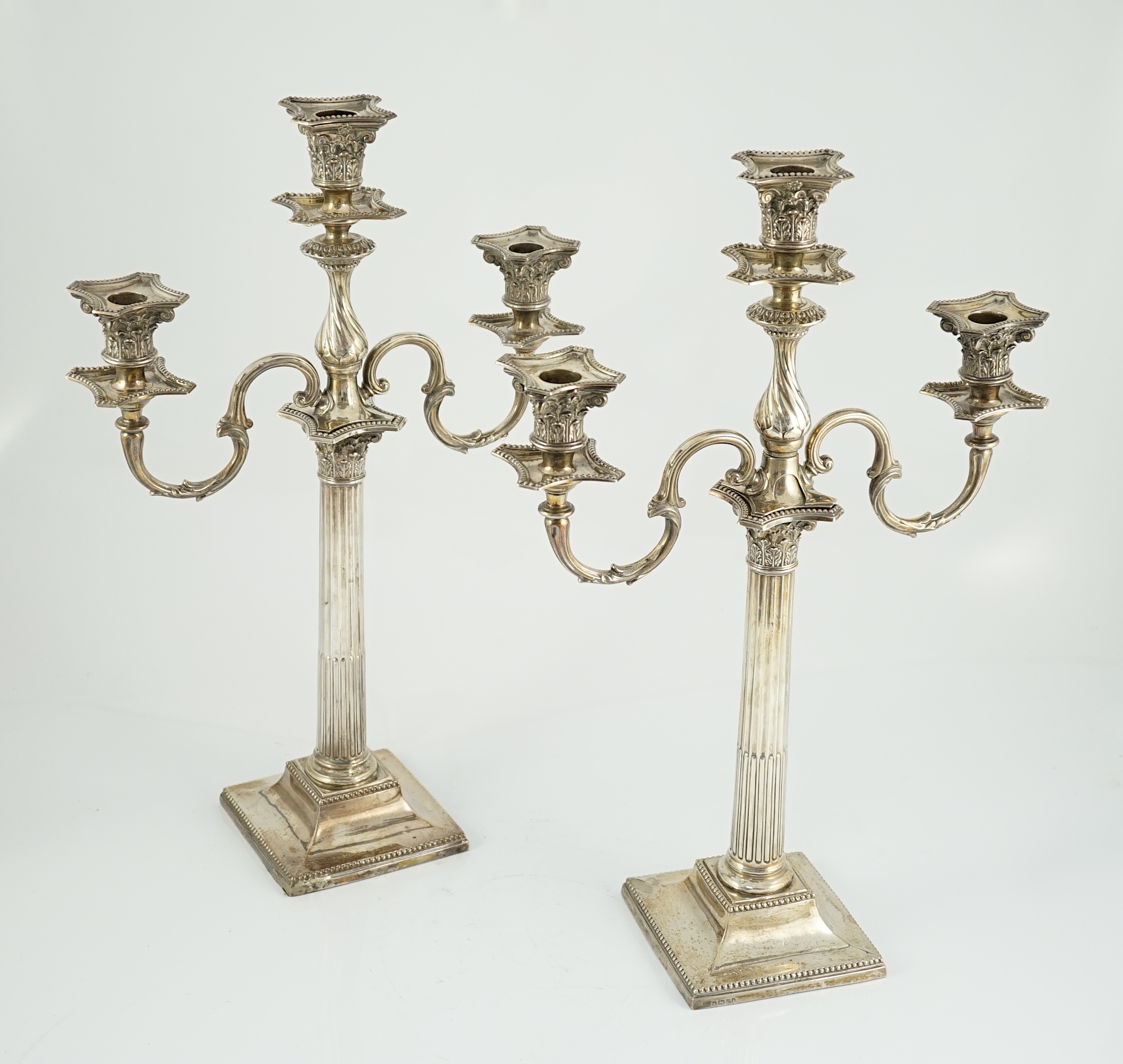 A matched pair of late 19th/early 20th century silver two branch, three light candelabrum, with - Image 4 of 6