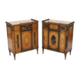 A pair of French Transitional style satinwood and marquetry side cabinets, each with fretwork