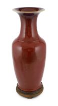 A large Chinese sang de boeuf glazed vase, early 20th century, flambé glaze to the mouth, unglazed