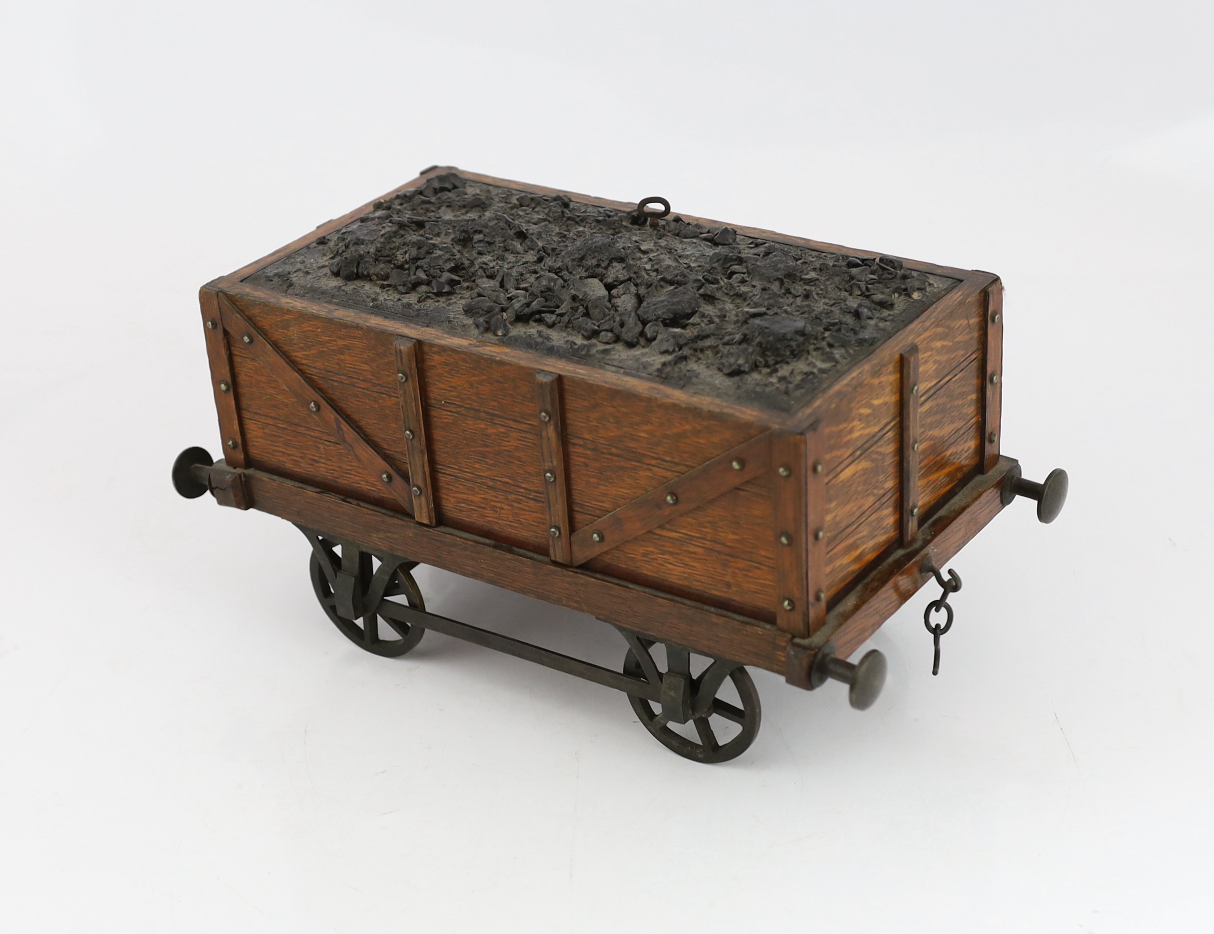 An Edwardian novelty oak smoker's compendium modelled as a railway tender, with simulated coal - Image 2 of 6