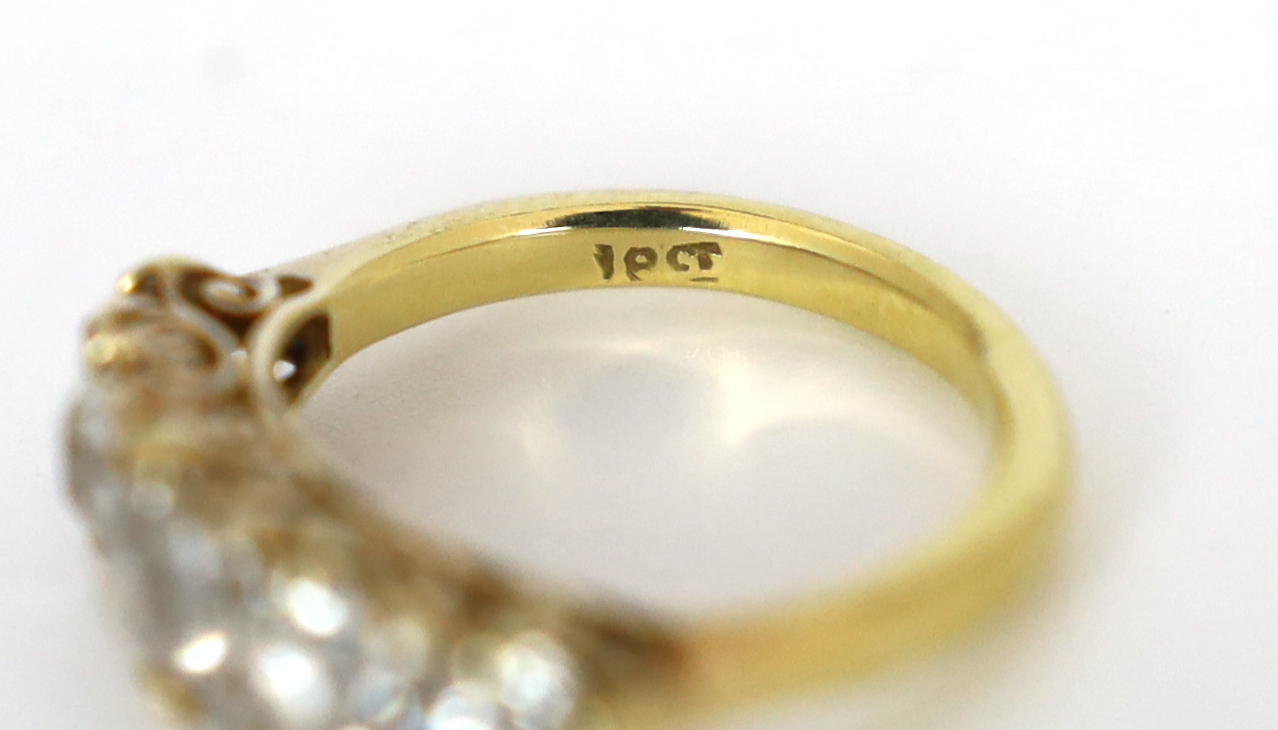 An early 20th century 18ct gold and graduated old round cut diamond set half hoop ring, with diamond - Image 4 of 4