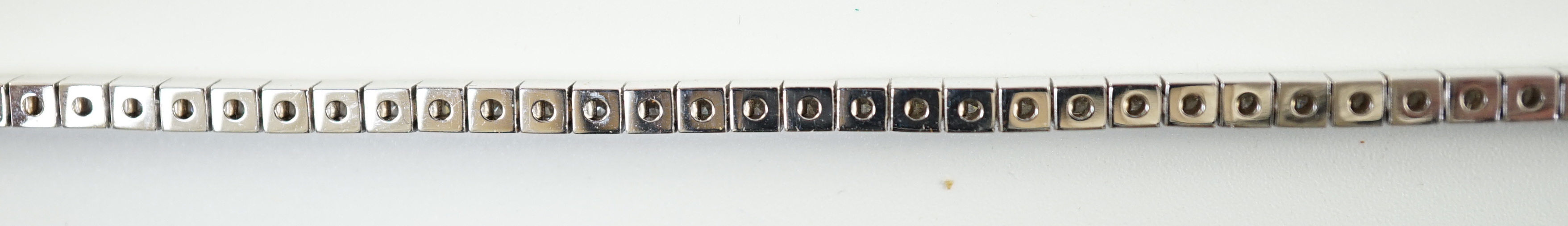 A late 20th century Cartier 18ct white gold and diamond set line bracelet, set with sixty one - Image 2 of 5