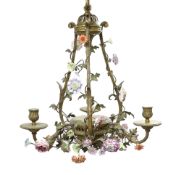*A Louis XVI style ormolu and porcelain three light chandelier with scrollwork frame, three
