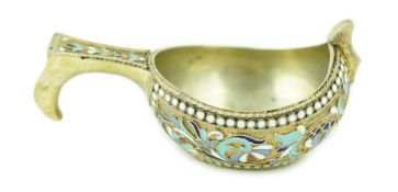 A late 19th/early 20th century Russian 84 zolotnik silver gilt and polychrome enamelled kovsh,