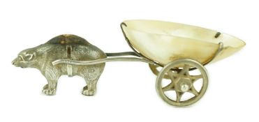 An Edwardian novelty silver and mother of pearl pin cushion, modelled as a bear pulling a cart, Adie