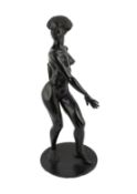 Ronald Cameron (1930-2013), a black patinated cast pewter figure of an African woman, signed and