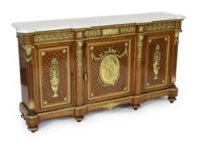 * * A Louis XVI style amboyna, tulipwood and harewood marquetry side cabinet, in the manner of