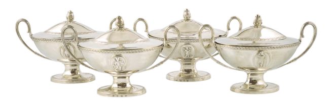 A good set of four George III silver oval pedestal sauce tureen's and covers, with applied panels of