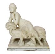 An early 20th century French carved white marble figure of a semi-clad woman seated upon a daybed,