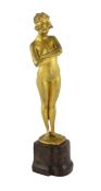 Paul Philippe (French, 1870-1930), a gilt bronze figure of a standing nude woman, 'The Challenge',