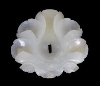 * A Chinese small white jade flower head, Song/Yuan dynasty, 12th/13th century, in the form of a