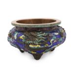 A rare Chinese champlevé enamel and copper repousse work ‘dragon’ censer, Xuande six character mark,
