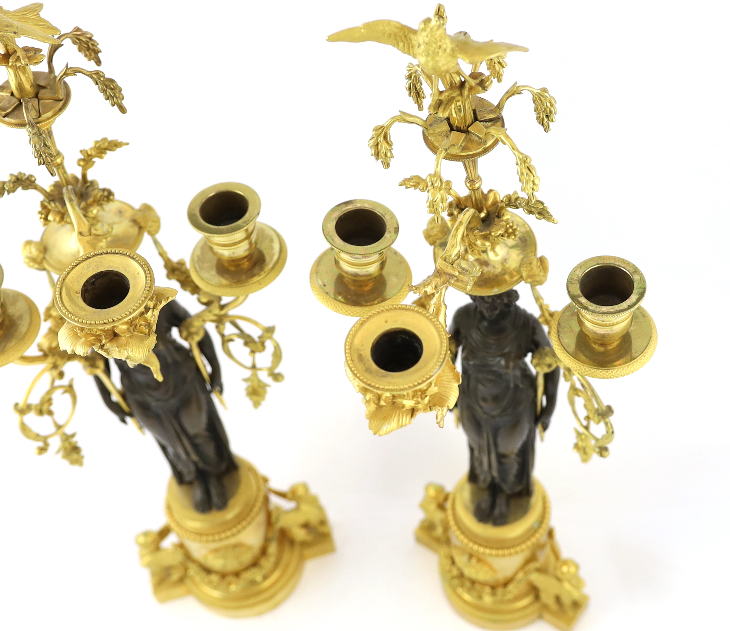 * A pair of late 19th century French Empire style bronze and ormolu three light candelabra, with - Image 3 of 7