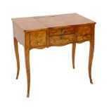 * A Louis XV marquetry inlaid kingwood poudreuse, on cabriole legs, 76cm wide, 46.5cm deep, 71cm