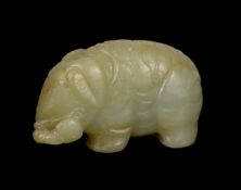* A Chinese small mellow green jade model of a standing elephant, 17th century, 4.
