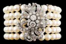A mid to late 20th century continental quintuple strand cultured pearl bracelet, with white gold and