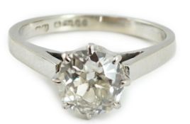 A 1970's 18ct white gold and solitaire diamond set ring, the round cut stone weighing