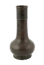 A Chinese bronze vase, Song-Yuan dynasty, the neck and foot decorated with a band of scrolls, 23cm