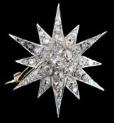 A Victorian gold, silver and graduated diamond cluster starburst brooch, set with old round and