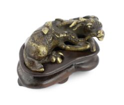 * A Chinese bronze weight, in the form of a recumbent deer, late Ming/early Qing dynasty, 5.2cm