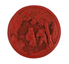 * A Chinese cinnabar lacquer circular box, Qianlong period, the lid carved with a scholar and