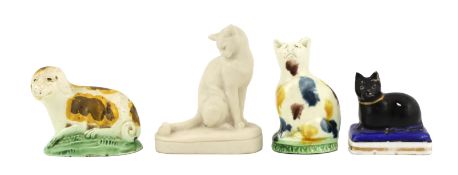 Two Staffordshire creamware models of a seated cat and a recumbent dog, c.1780, 6.5 and 4.8cm