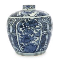 A Chinese late Ming blue and white jar, Wanli period, typically painted with flower and rockwork