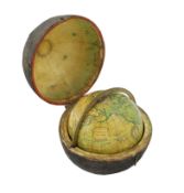 A Newton's 'New & Improved terrestrial pocket globe', with brass gimbal mount and original