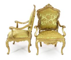 * * A set of six 18th century Venetian carved giltwood open armchairs, the cartouche shaped backs
