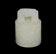 * A Chinese miniature white jade seal of archaic bronze bell form, late Qing dynasty, carved in