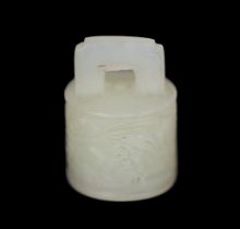 * A Chinese miniature white jade seal of archaic bronze bell form, late Qing dynasty, carved in