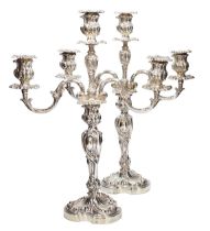A good pair of late Victorian Elkington & Co. silver twin branch, three light candelabra, of