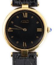A lady's modern silver gilt Must de Cartier Vermail quartz wrist watch, with dot and quarterly Roman