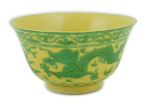 A Chinese green and yellow glazed 'dragon' bowl, Daoguang mark and of the period (1821-50), the