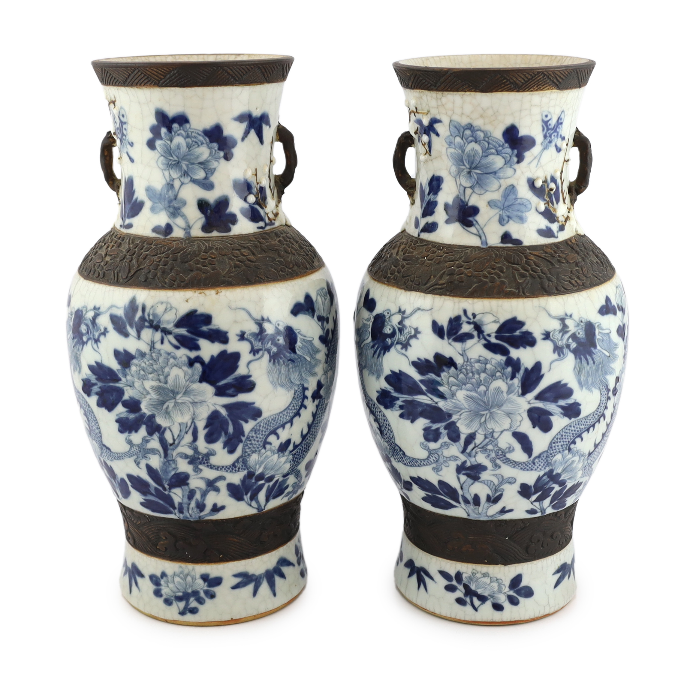 A pair of large Chinese blue and white crackle-glaze ‘dragon’ vases, early 20th century, each