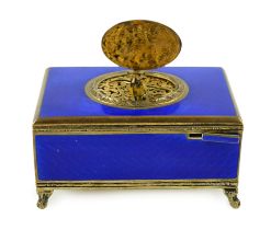 An early 20th century sterling silver gilt and blue guilloche enamelled rectangular singing bird