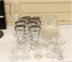 A part suite of etched and silver banded wine glasses together with other glassware***CONDITION