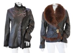 Two Desch lady's brown leather coats, one with fur collar the other with suede ruffle detail, both