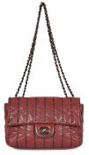 ** ** A Chanel Classic Jumbo Flap burgundy lambskin quilted shoulder bag, with pinstripe
