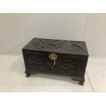 * * A late 19th century Cantonese carved camphorwood chest, width 100cmPlease note this lot attracts