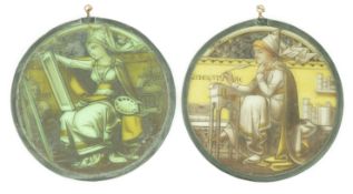 A pair of Victorian stained glass panels, depicting Literature and Art, 21.5cm diameter***