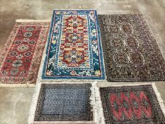 A Tekke mat, two Bokhara mats and two rugs, (5), largest 132 x 78cm***CONDITION REPORT***PLEASE