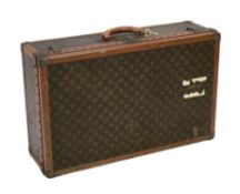A vintage Louis Vuitton suitcase with monogram canvas and tan leather, initialled A.D, interior with