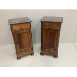 A pair of late 19th century French walnut bedside cabinets with grey marble tops, width 38cm***